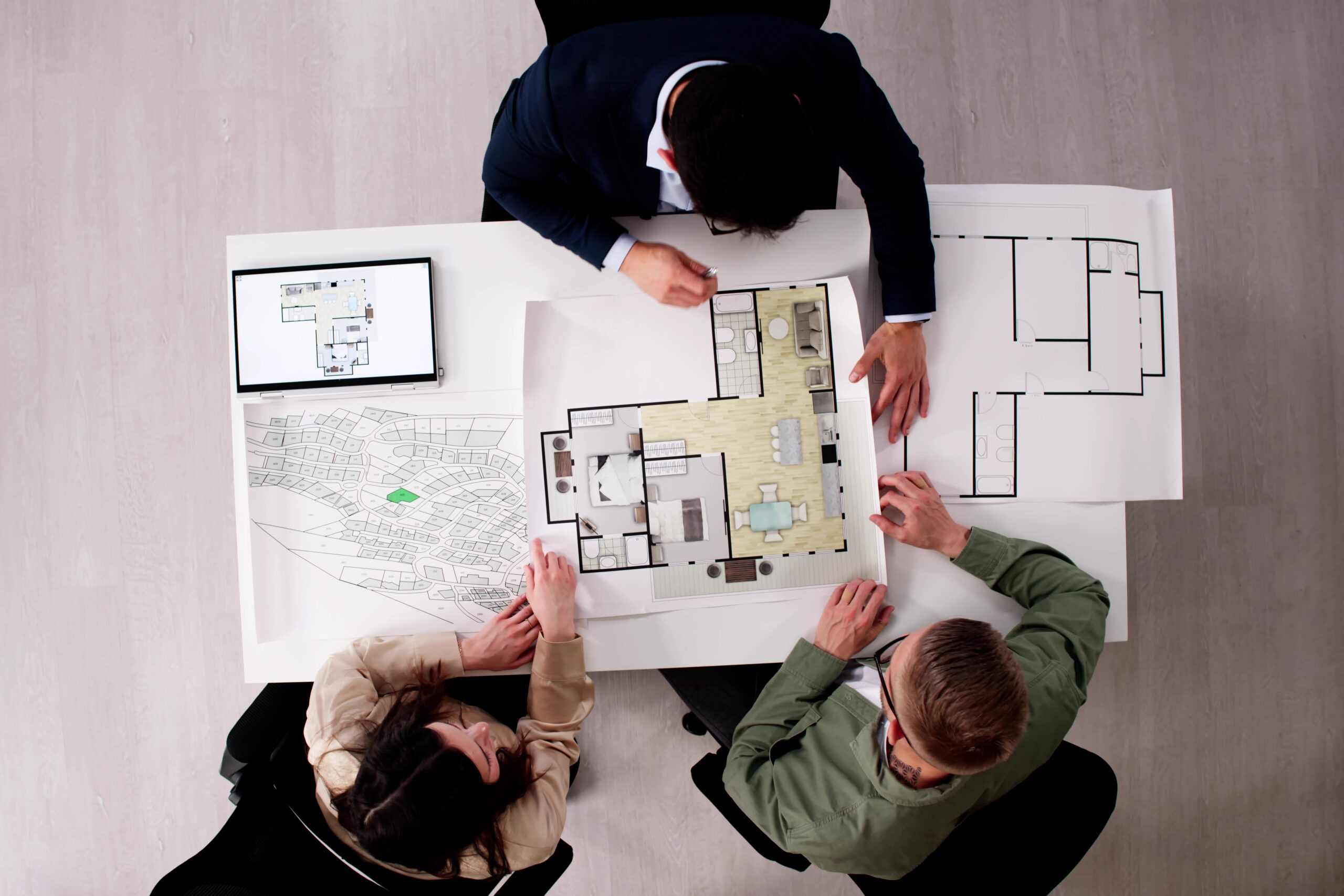 Young,Couple,Consult,With,Real,Estate,Agent,For,House,Advice.